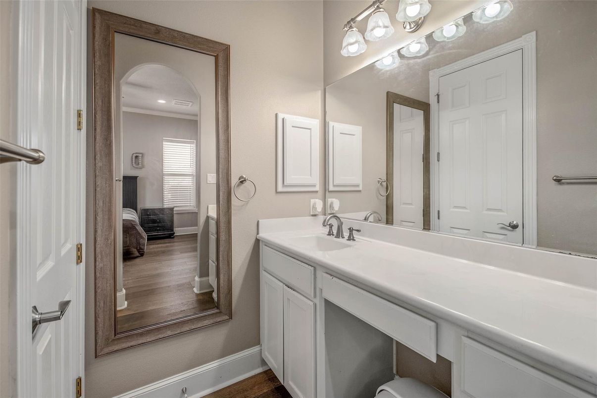 Bathroom, Dual Sink Vanities, Interior, Recessed Lighting, Wood Texture Flooring