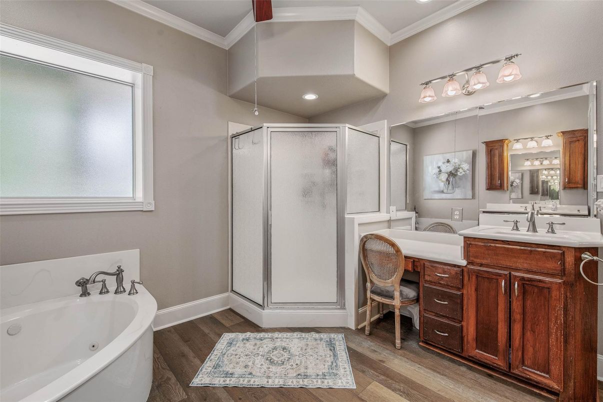 Bathroom, Dual Sink Vanities, Free Standing Baths, Glass Shower, Interior, Recessed Lighting, Wood Texture Flooring