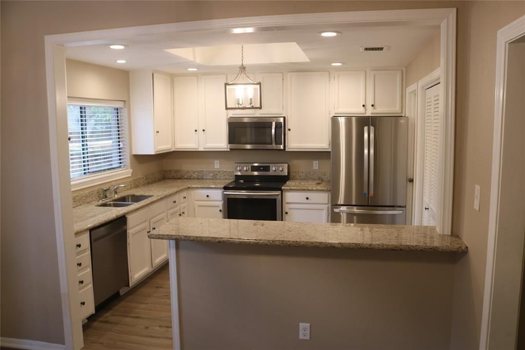 Interior, Kitchen, Pendant Lights, Recessed Lighting, Stainless Steel Appliances, Wood Texture Flooring