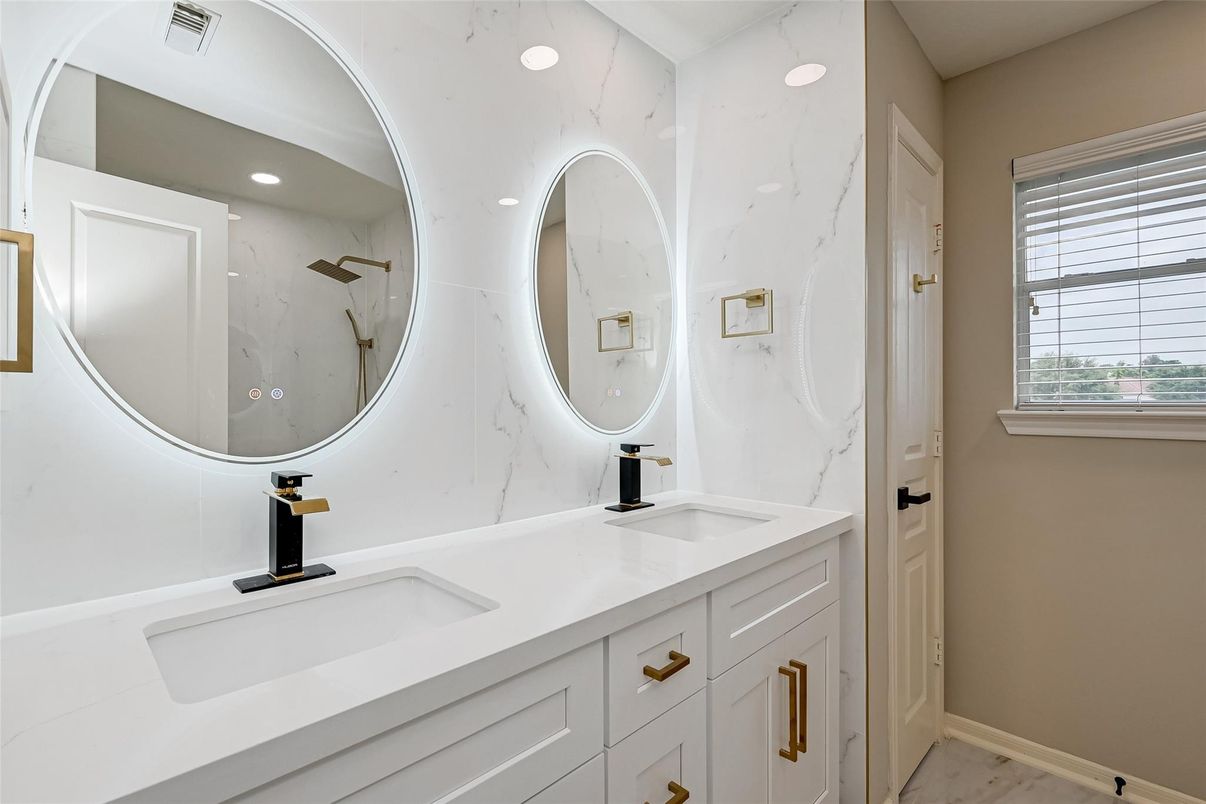 Bathroom, Dual Sink Vanities, Interior, Marble Walls, Recessed Lighting