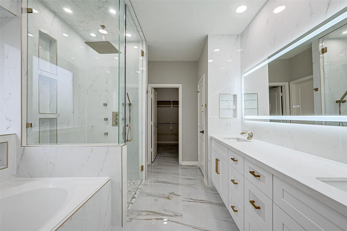 Bathroom, Dual Sink Vanities, Glass Shower, Interior, Marble, Marble Walls, Recessed Lighting