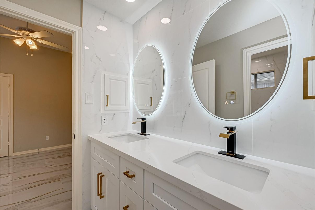 Bathroom, Dual Sink Vanities, Interior, Marble Walls, Recessed Lighting