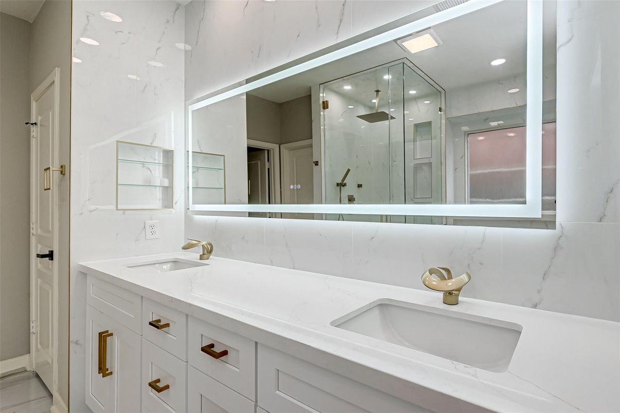 Bathroom, Dual Sink Vanities, Glass Shower, Interior, Marble Walls, Recessed Lighting