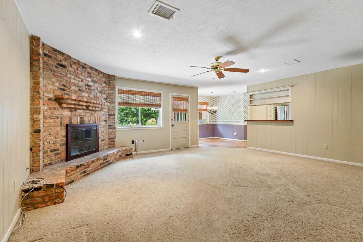 Chandelier, Empty room, Fireplace, Interior, Recessed Lighting, Stone Walls