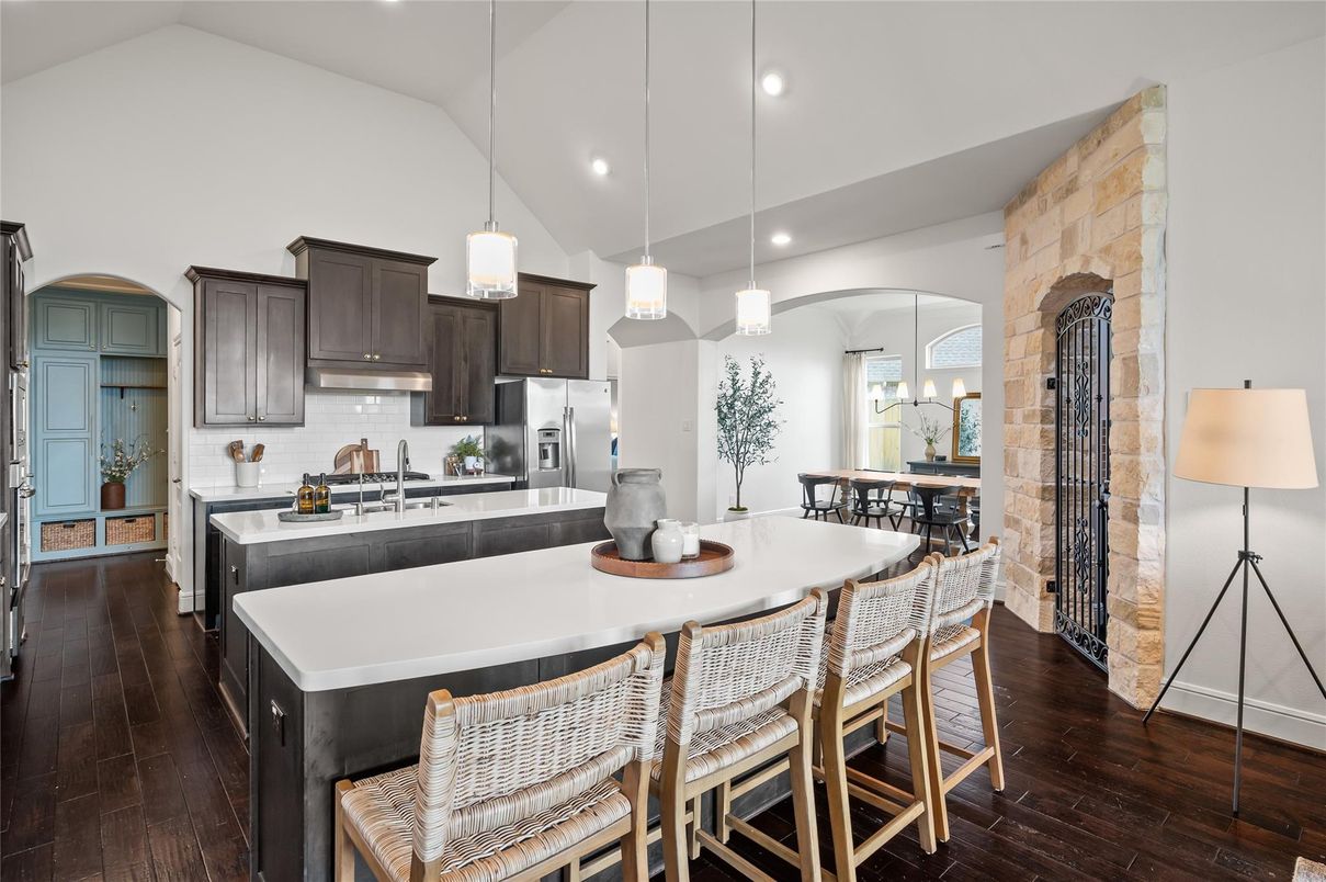 Dining room, Interior, Kitchen, Pendant Lights, Recessed Lighting, Stainless Steel Appliances, Stone Walls, Wood Texture Flooring