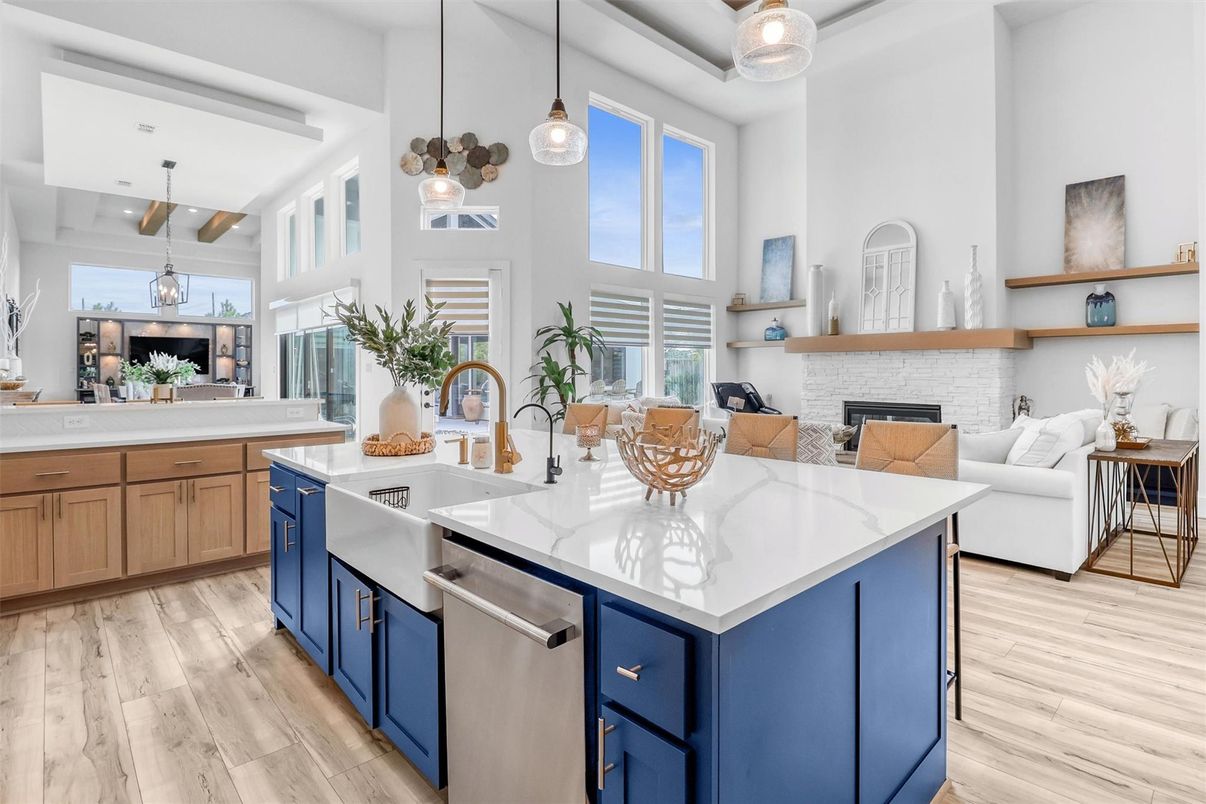 Fireplace, Interior, Kitchen, Living room, Pendant Lights, Recessed Lighting, Stainless Steel Appliances, Wood Texture Flooring
