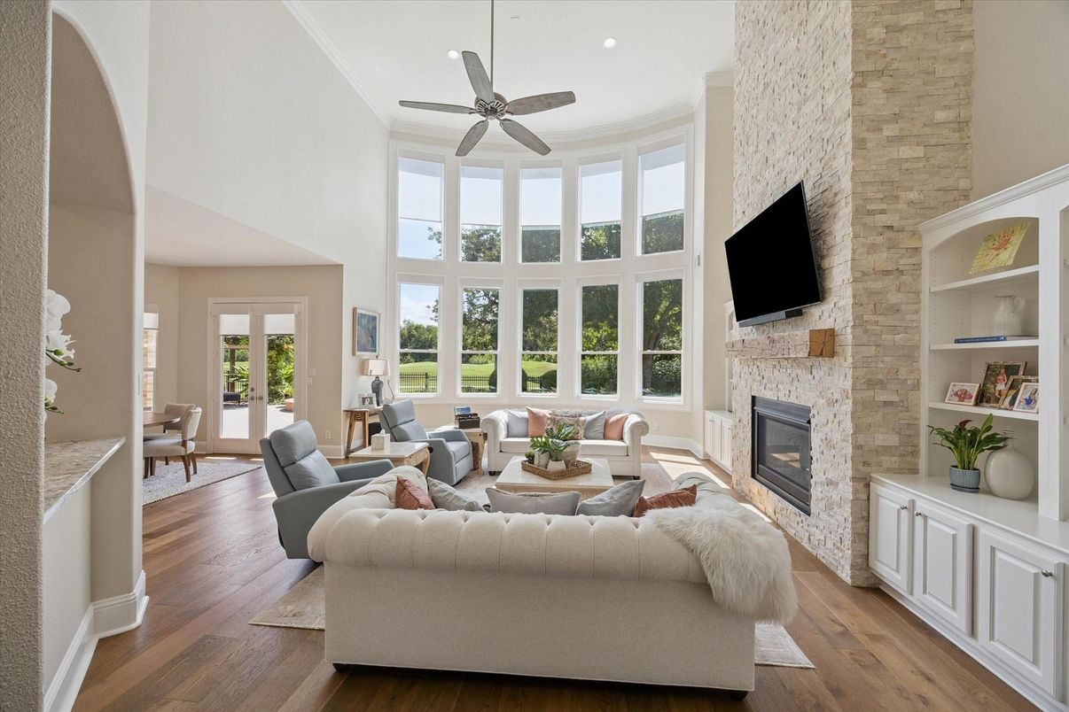 Fireplace, Interior, Living room, Recessed Lighting, Stone Walls, Wood Texture Flooring