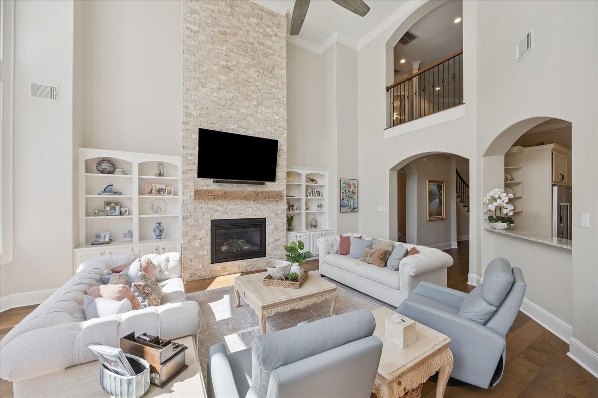 Fireplace, Interior, Living room, Recessed Lighting, Stone Walls, Wood Texture Flooring