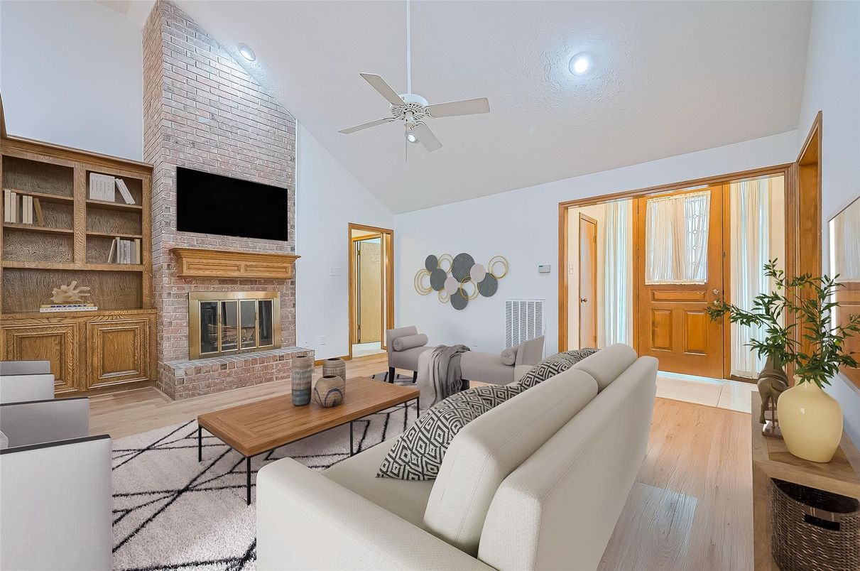 Fireplace, Interior, Living room, Recessed Lighting, Stone Walls, Wood Texture Flooring