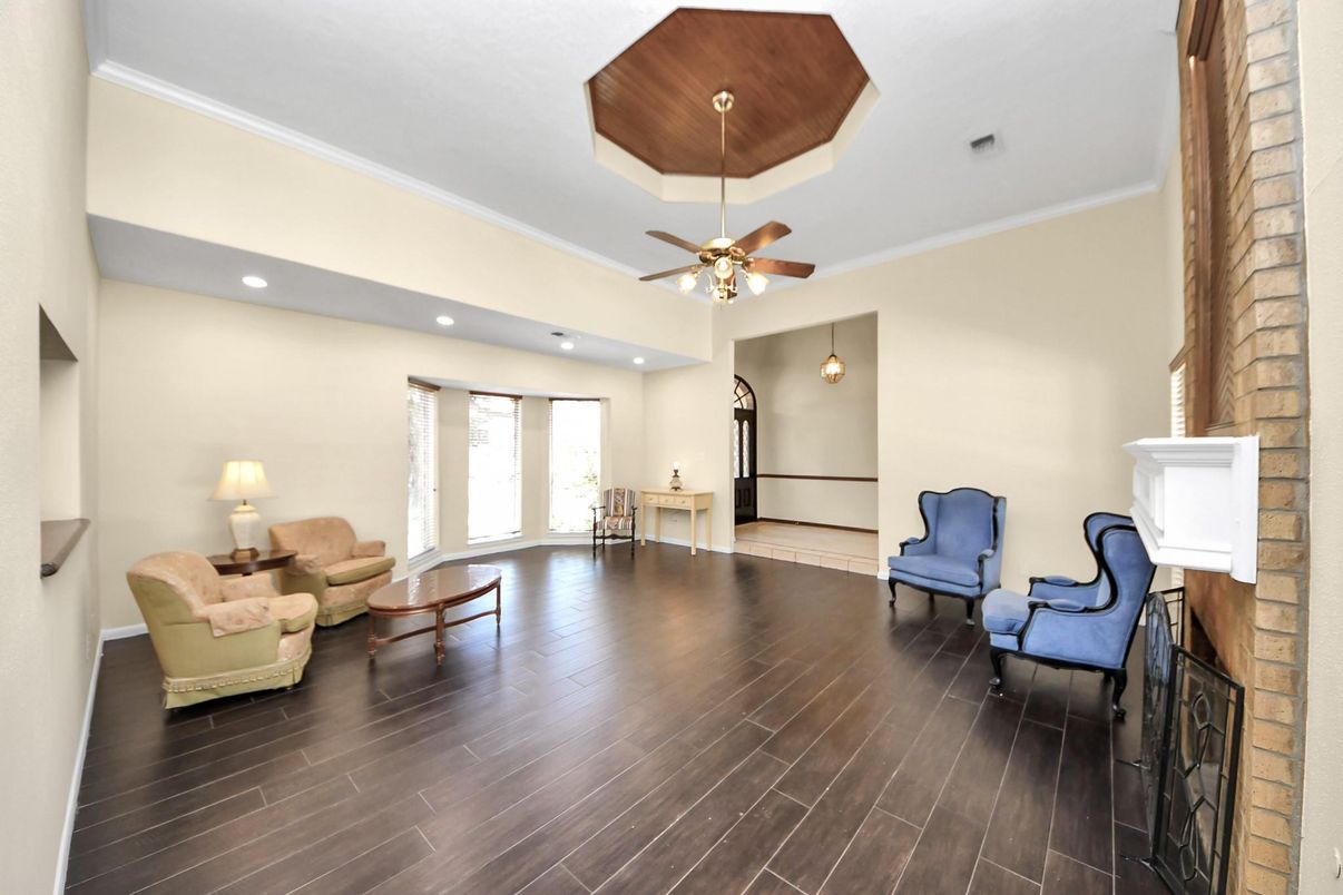 Fireplace, Interior, Recessed Lighting, Stone Walls, Wood Texture Flooring