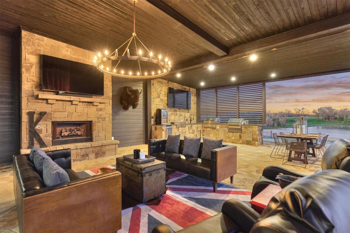 Dining room, Fireplace, Interior, Living room, Pendant Lights, Stone Walls, Water, Wooden Beams, Wooden Ceilings