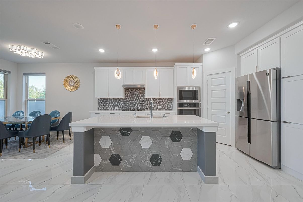 Dining room, Interior, Kitchen, Marble, Pendant Lights, Recessed Lighting, Stainless Steel Appliances