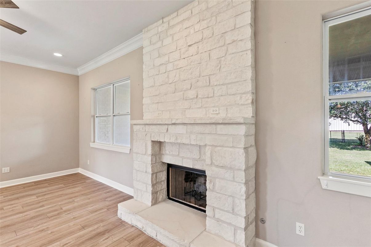 Fireplace, Interior, Recessed Lighting, Stone Walls, Wood Texture Flooring