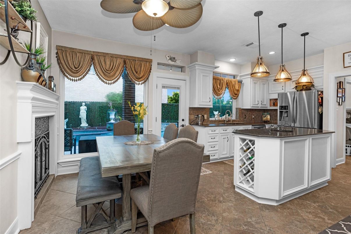 Dining room, Fireplace, Interior, Kitchen, Pendant Lights, Recessed Lighting, Stainless Steel Appliances