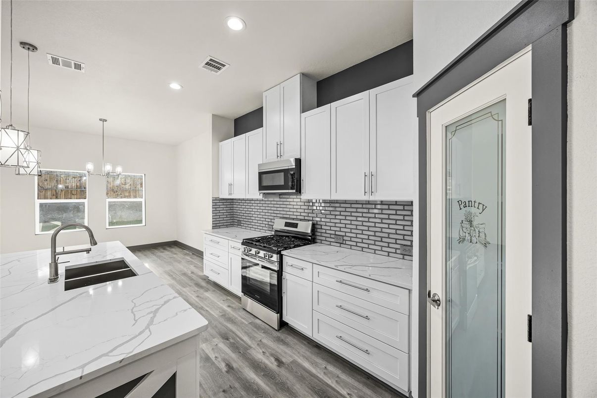 Interior, Kitchen, Pendant Lights, Recessed Lighting, Stainless Steel Appliances, Wood Texture Flooring