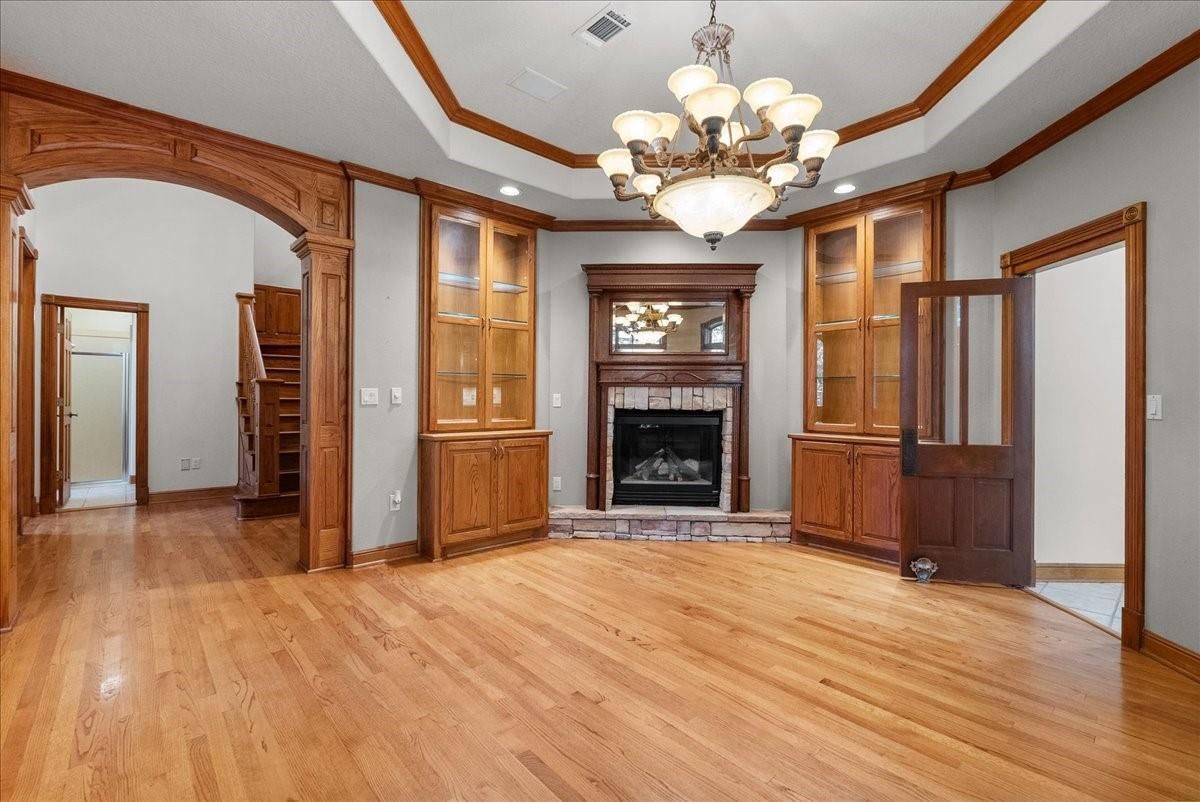Chandelier, Empty room, Fireplace, Interior, Recessed Lighting, Wood Texture Flooring