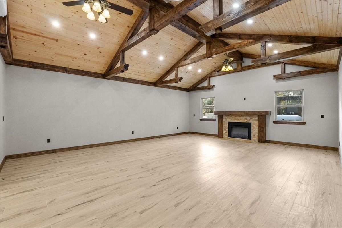 Empty room, Fireplace, Interior, Recessed Lighting, Wooden Beams, Wooden Ceilings, Wood Texture Flooring