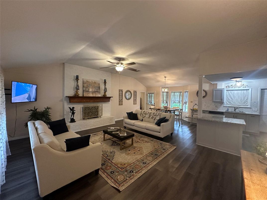 Dining room, Fireplace, Interior, Kitchen, Living room, Pendant Lights, Wood Texture Flooring