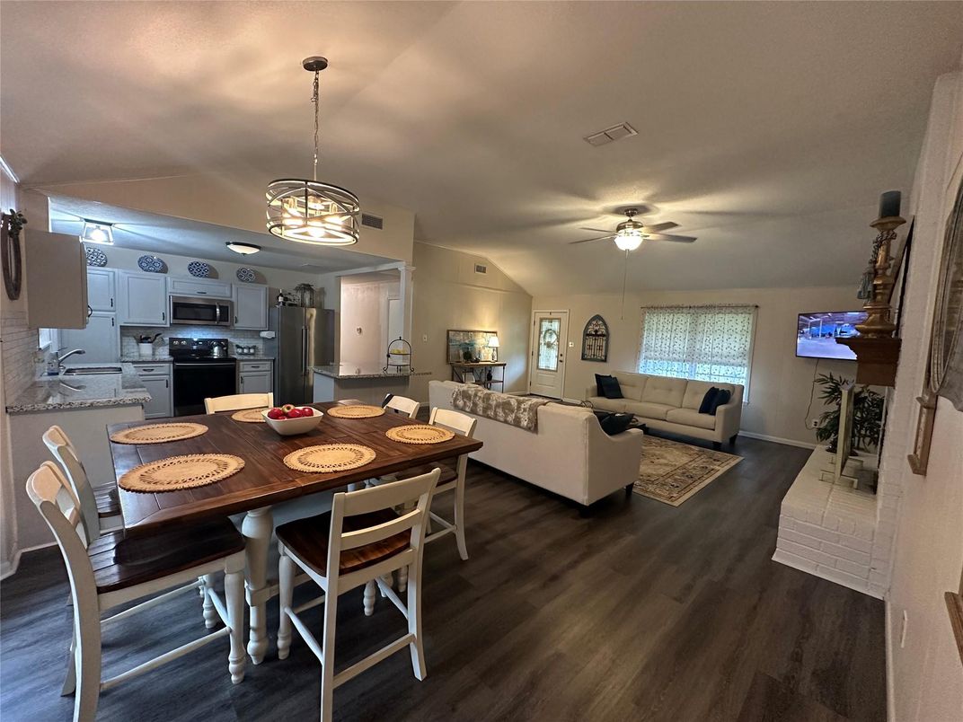 Dining room, Interior, Kitchen, Living room, Pendant Lights, Stainless Steel Appliances, Wood Texture Flooring