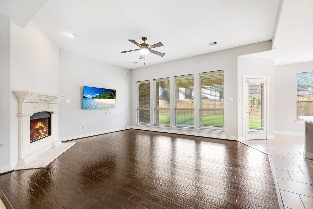 Empty room, Fireplace, Interior, Recessed Lighting, Wood Texture Flooring
