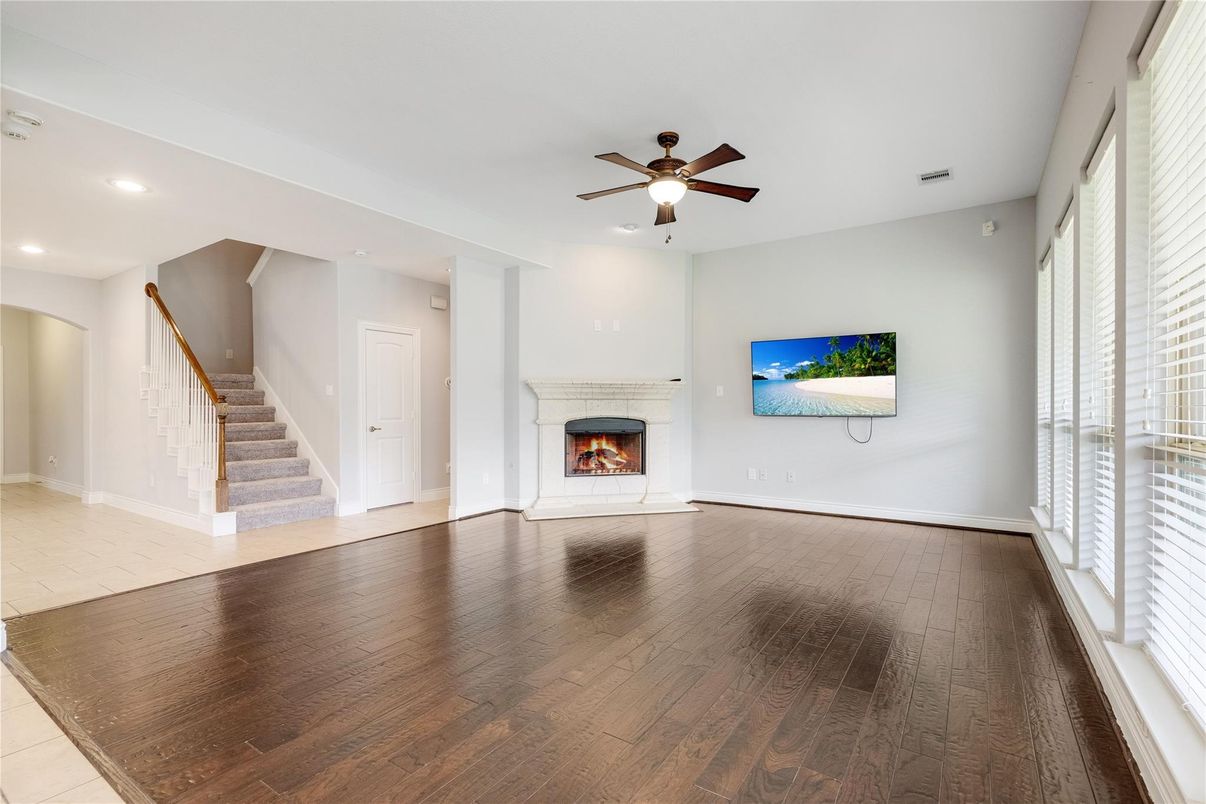 Empty room, Fireplace, Interior, Recessed Lighting, Wood Texture Flooring