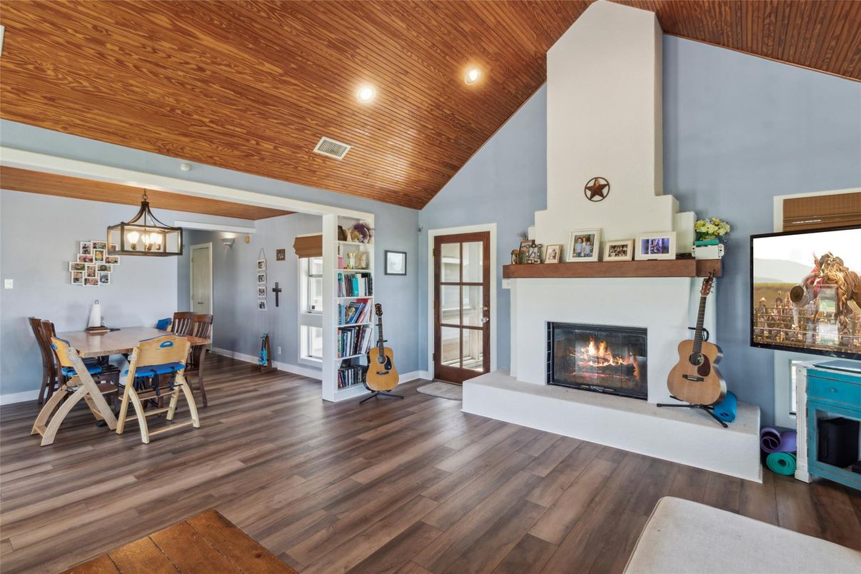 Dining room, Fireplace, Interior, Pendant Lights, Recessed Lighting, Wooden Ceilings, Wood Texture Flooring