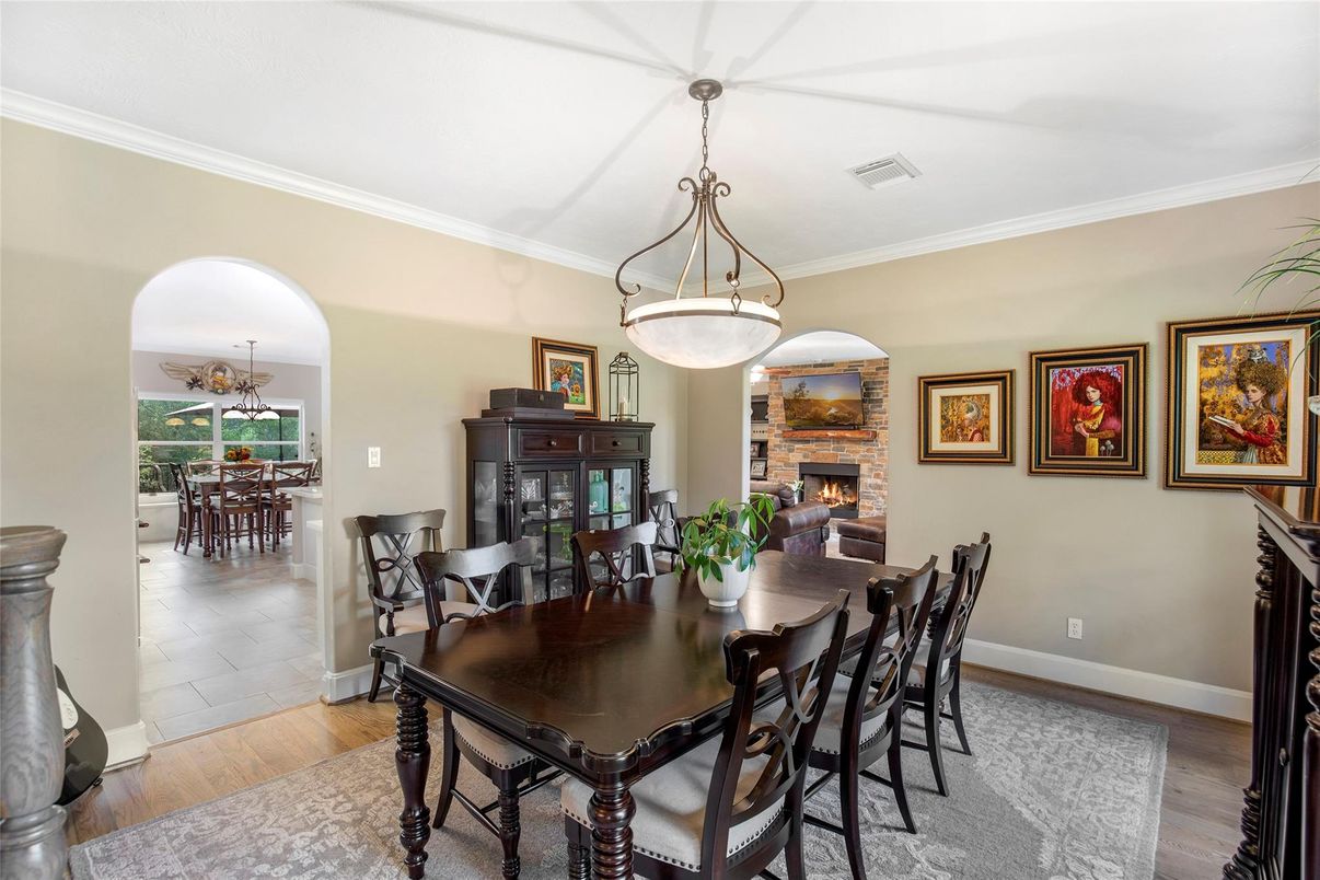 Chandelier, Dining room, Fireplace, Interior, Pendant Lights, Wood Texture Flooring