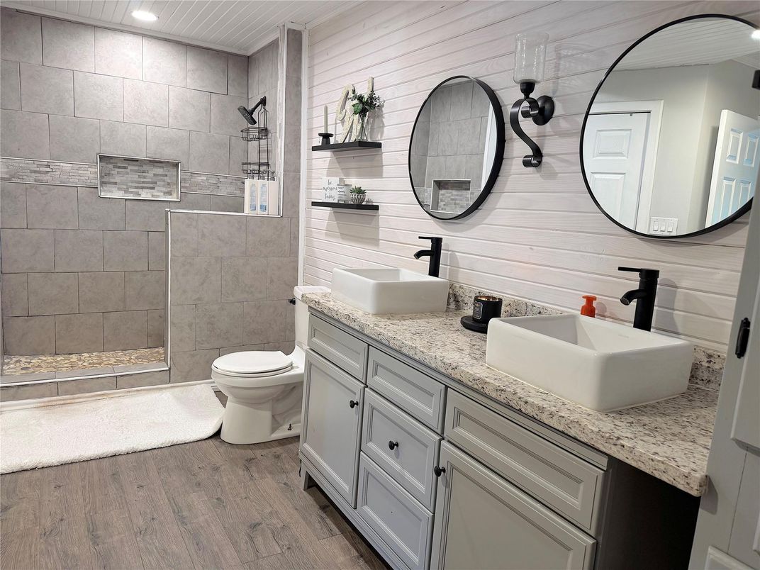 Bathroom, Dual Sink Vanities, Interior, Recessed Lighting, Wood Texture Flooring