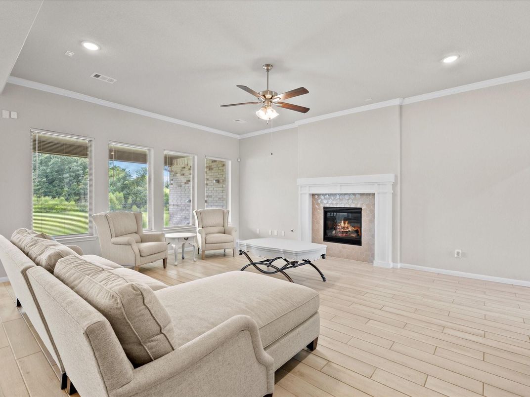 Fireplace, Interior, Living room, Recessed Lighting, Wood Texture Flooring