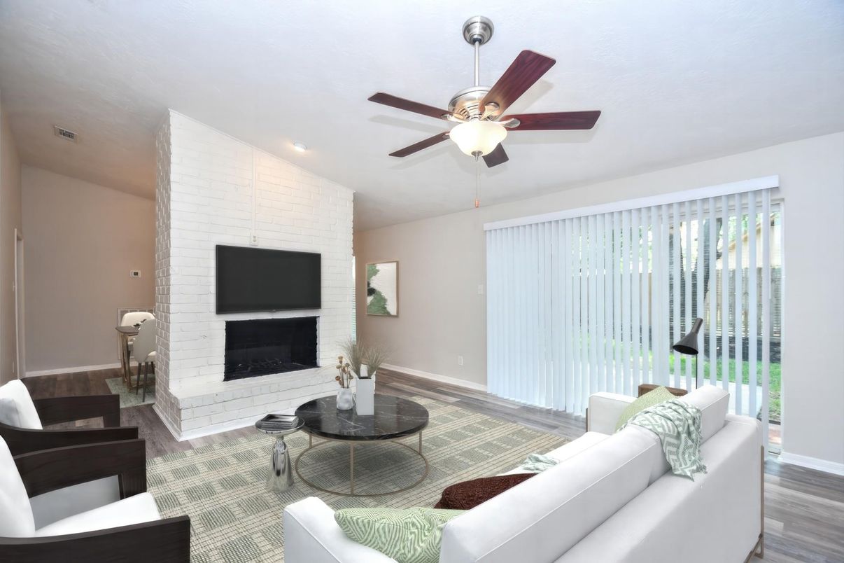 Fireplace, Interior, Living room, Recessed Lighting, Stone Walls, Wood Texture Flooring