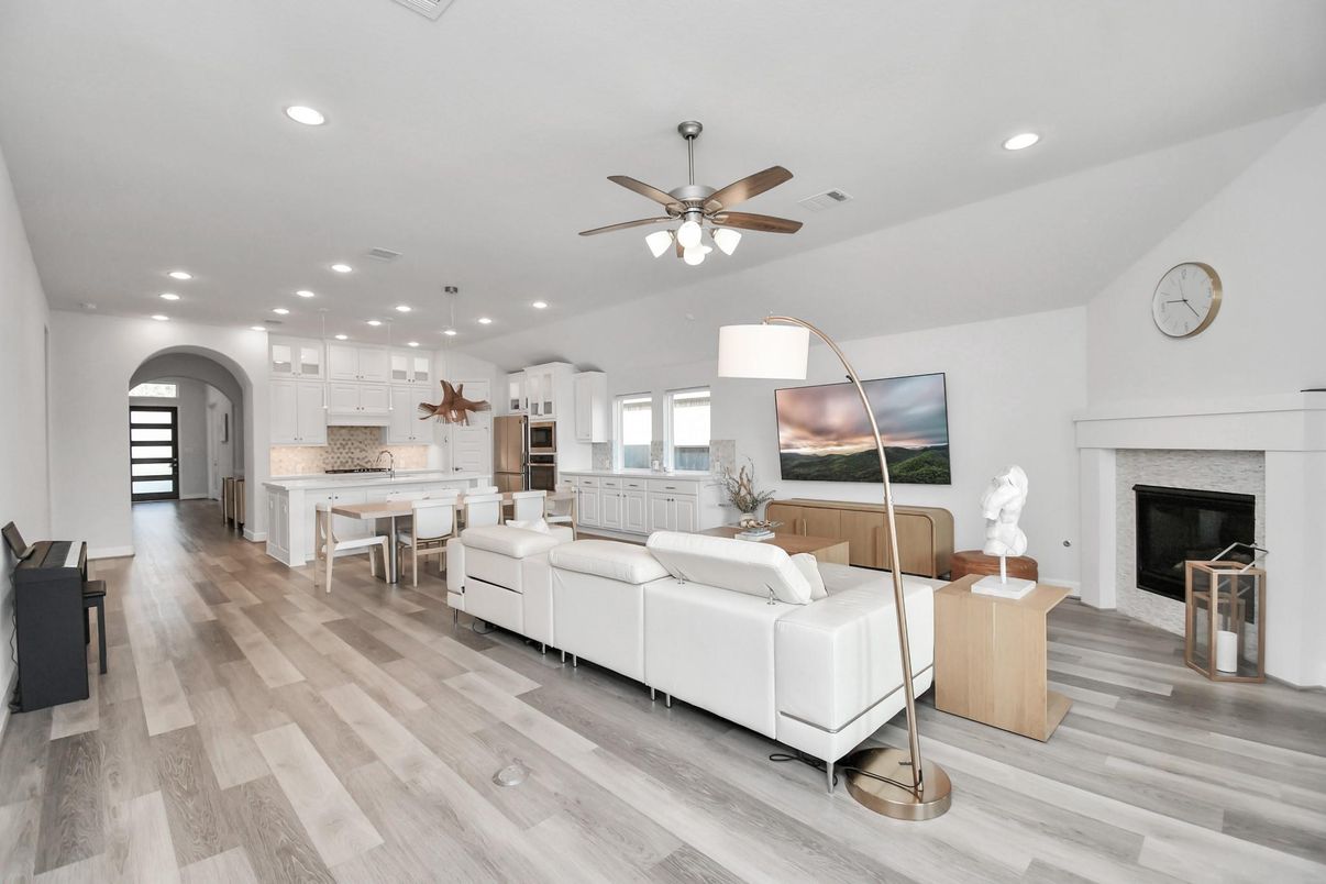 Fireplace, Interior, Kitchen, Living room, Pendant Lights, Recessed Lighting, Stainless Steel Appliances, Wood Texture Flooring
