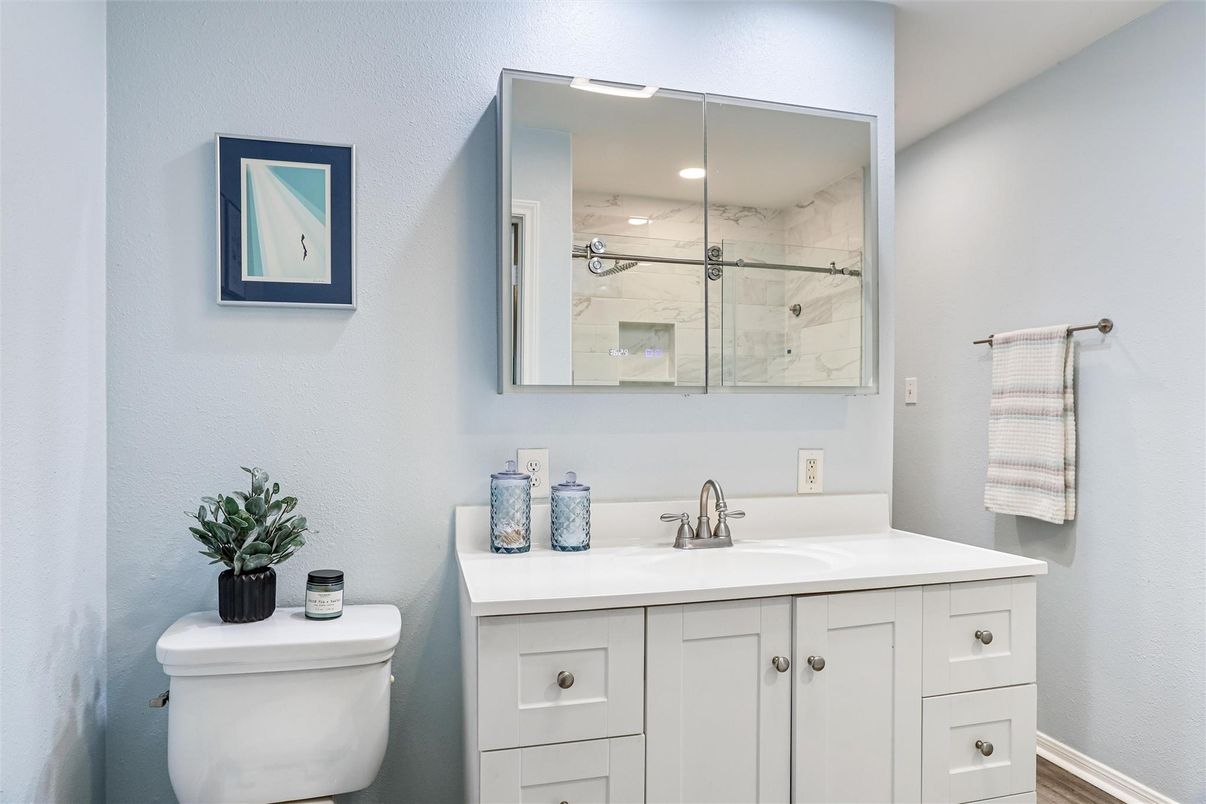 Bathroom, Glass Shower, Interior, Marble Walls, Recessed Lighting, Wood Texture Flooring