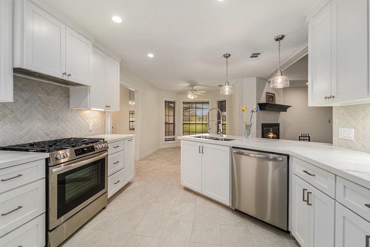 Fireplace, Interior, Kitchen, Pendant Lights, Recessed Lighting, Stainless Steel Appliances