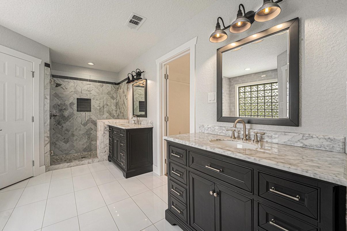Bathroom, Dual Sink Vanities, Glass Shower, Interior, Marble Walls, Recessed Lighting