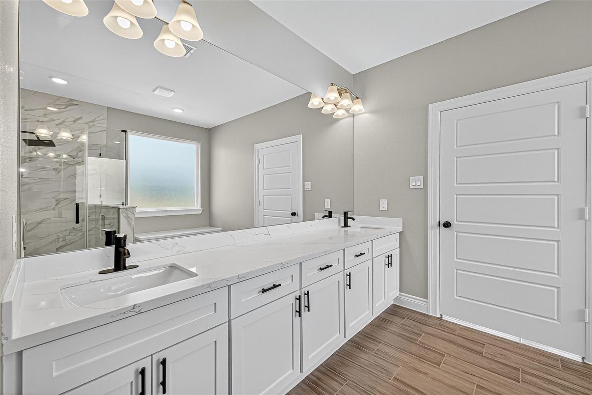 Bathroom, Dual Sink Vanities, Glass Shower, Interior, Recessed Lighting, Wood Texture Flooring