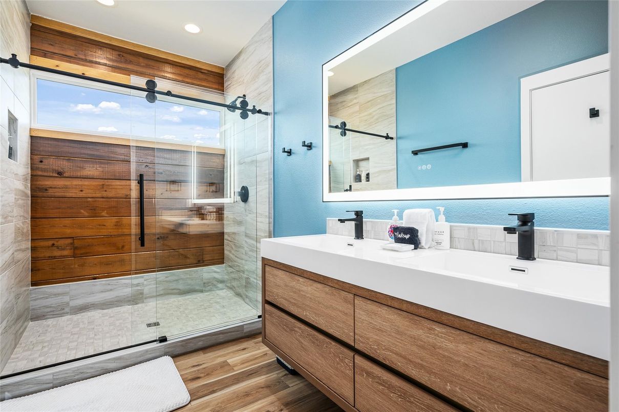 Bathroom, Dual Sink Vanities, Glass Shower, Interior, Recessed Lighting, Wood Texture Flooring