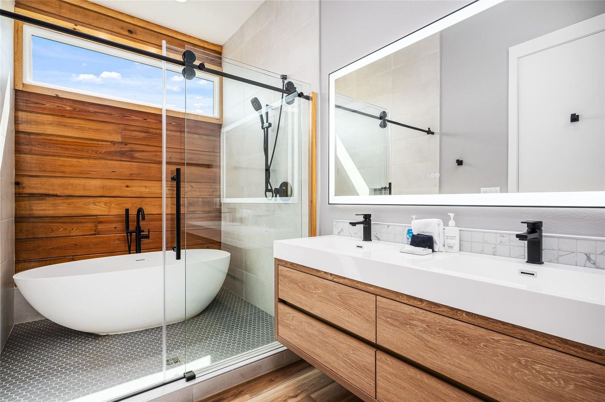 Bathroom, Dual Sink Vanities, Free Standing Baths, Glass Shower, Interior, Wood Texture Flooring, Wooden Walls