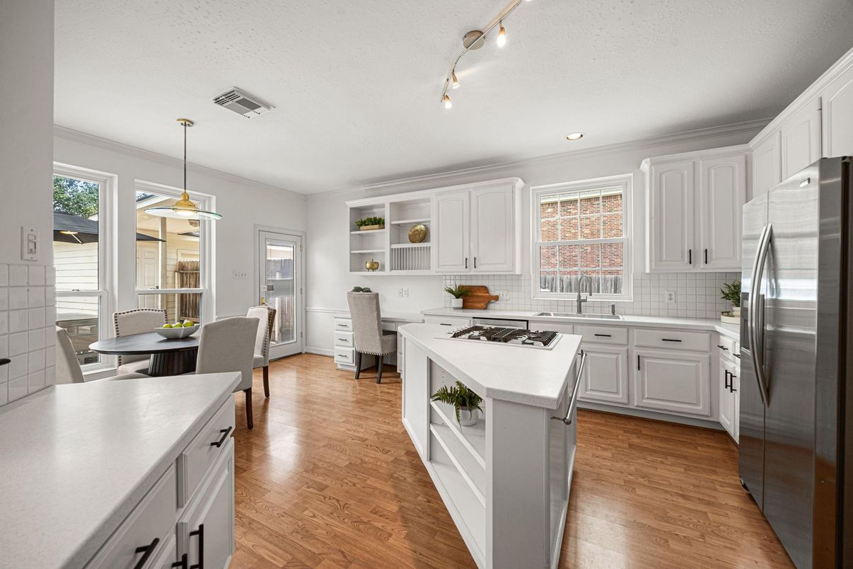 Dining room, Interior, Kitchen, Pendant Lights, Recessed Lighting, Stainless Steel Appliances, Wood Texture Flooring
