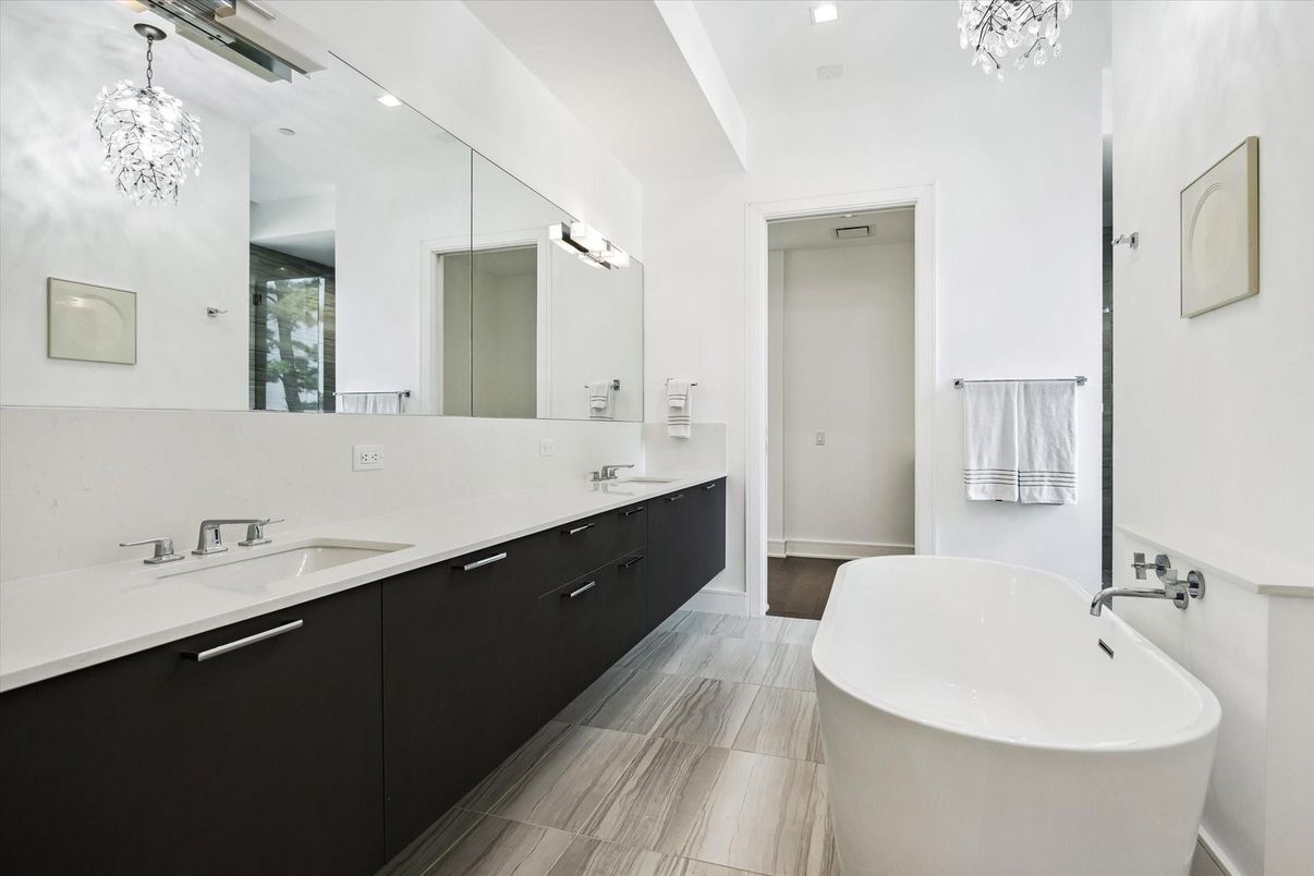 Bathroom, Chandelier, Dual Sink Vanities, Free Standing Baths, Interior, Pendant Lights, Recessed Lighting, Wood Texture Flooring
