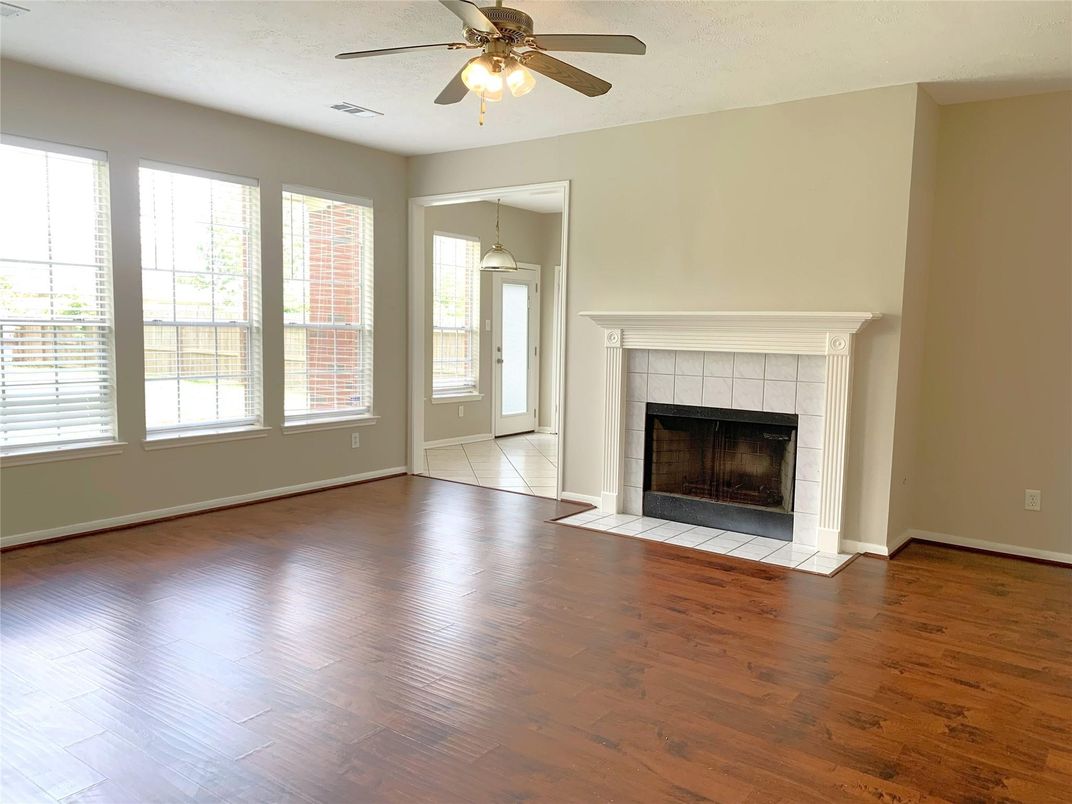 Empty room, Fireplace, Interior, Pendant Lights, Wood Texture Flooring