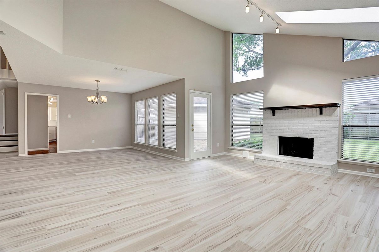 Chandelier, Empty room, Fireplace, Interior, Wood Texture Flooring
