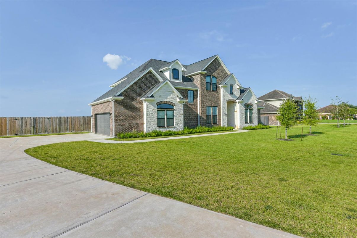 Attached, Backyard, Exterior, Facade, Brick Facade, French Provincial