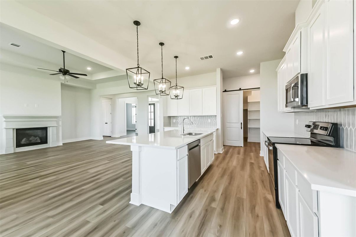 Fireplace, Interior, Kitchen, Pendant Lights, Recessed Lighting, Wood Texture Flooring