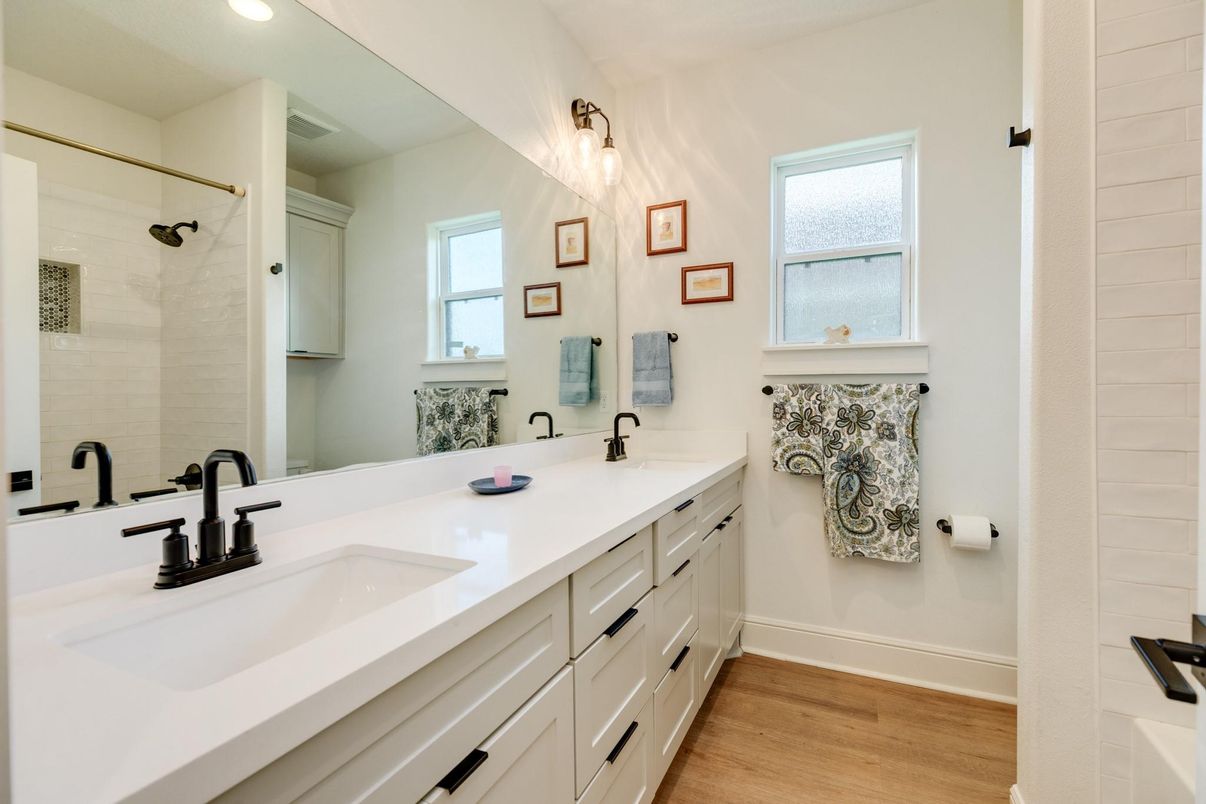Bathroom, Dual Sink Vanities, Interior, Recessed Lighting, Wood Texture Flooring