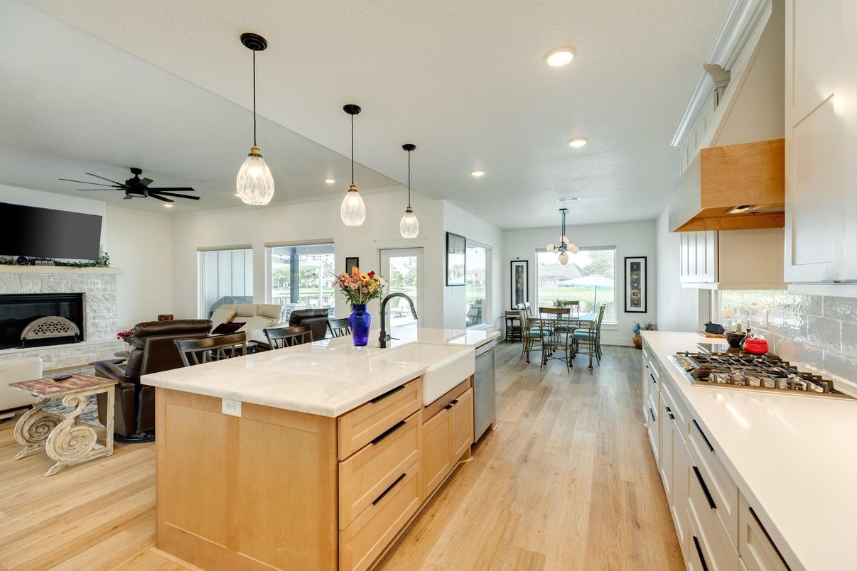 Dining room, Fireplace, Interior, Kitchen, Living room, Pendant Lights, Recessed Lighting, Wood Texture Flooring
