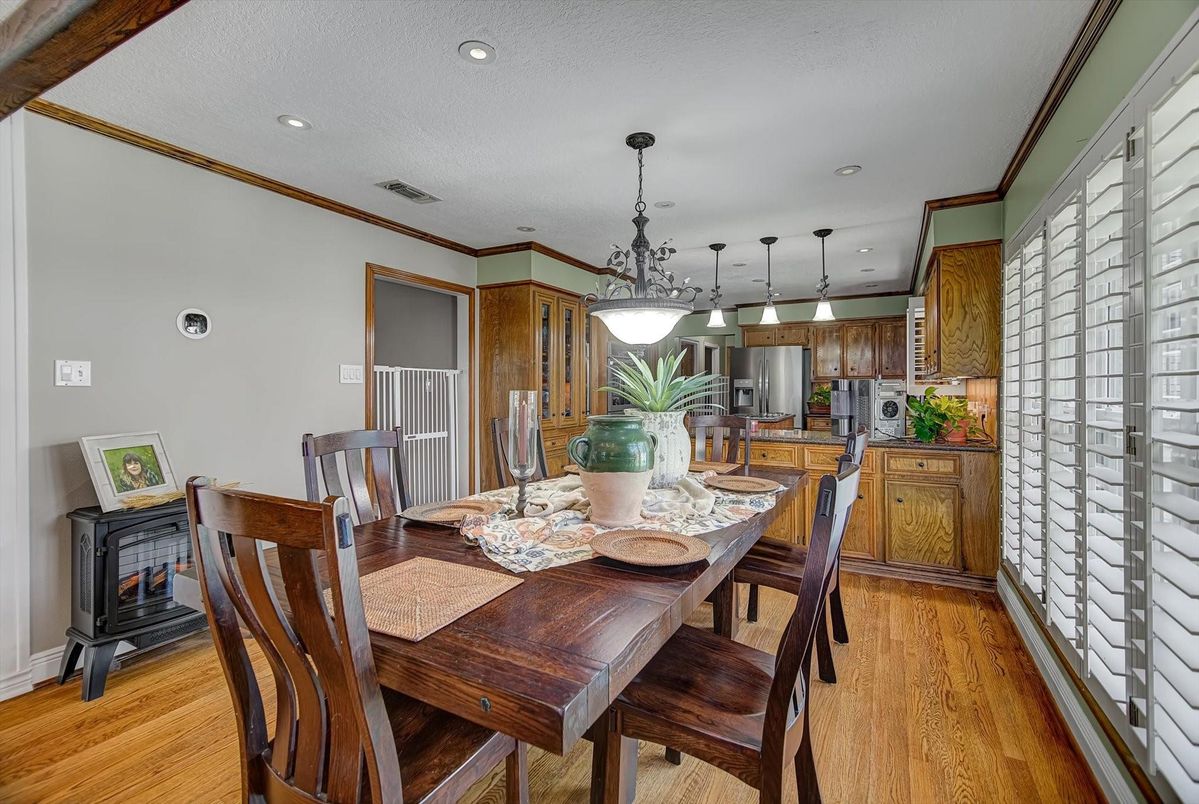 Dining room, Interior, Kitchen, Pendant Lights, Recessed Lighting, Stainless Steel Appliances, Wood Texture Flooring