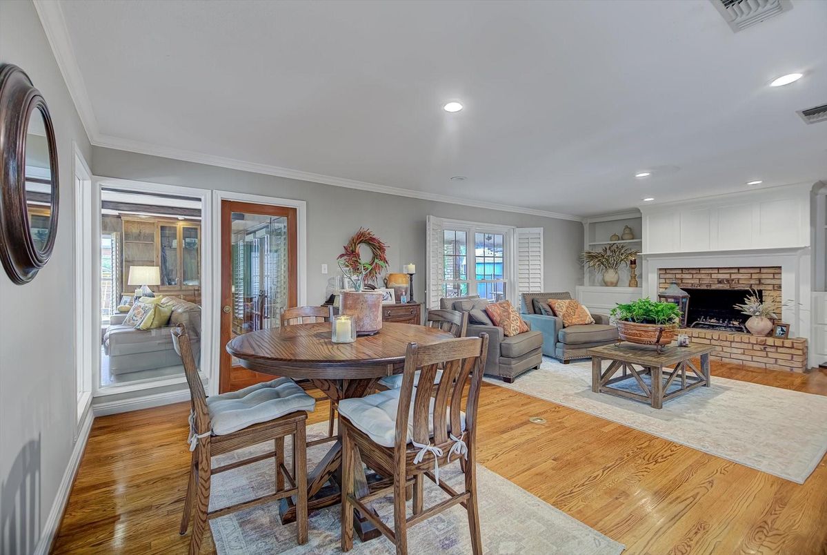 Dining room, Fireplace, Interior, Living room, Recessed Lighting, Wood Texture Flooring