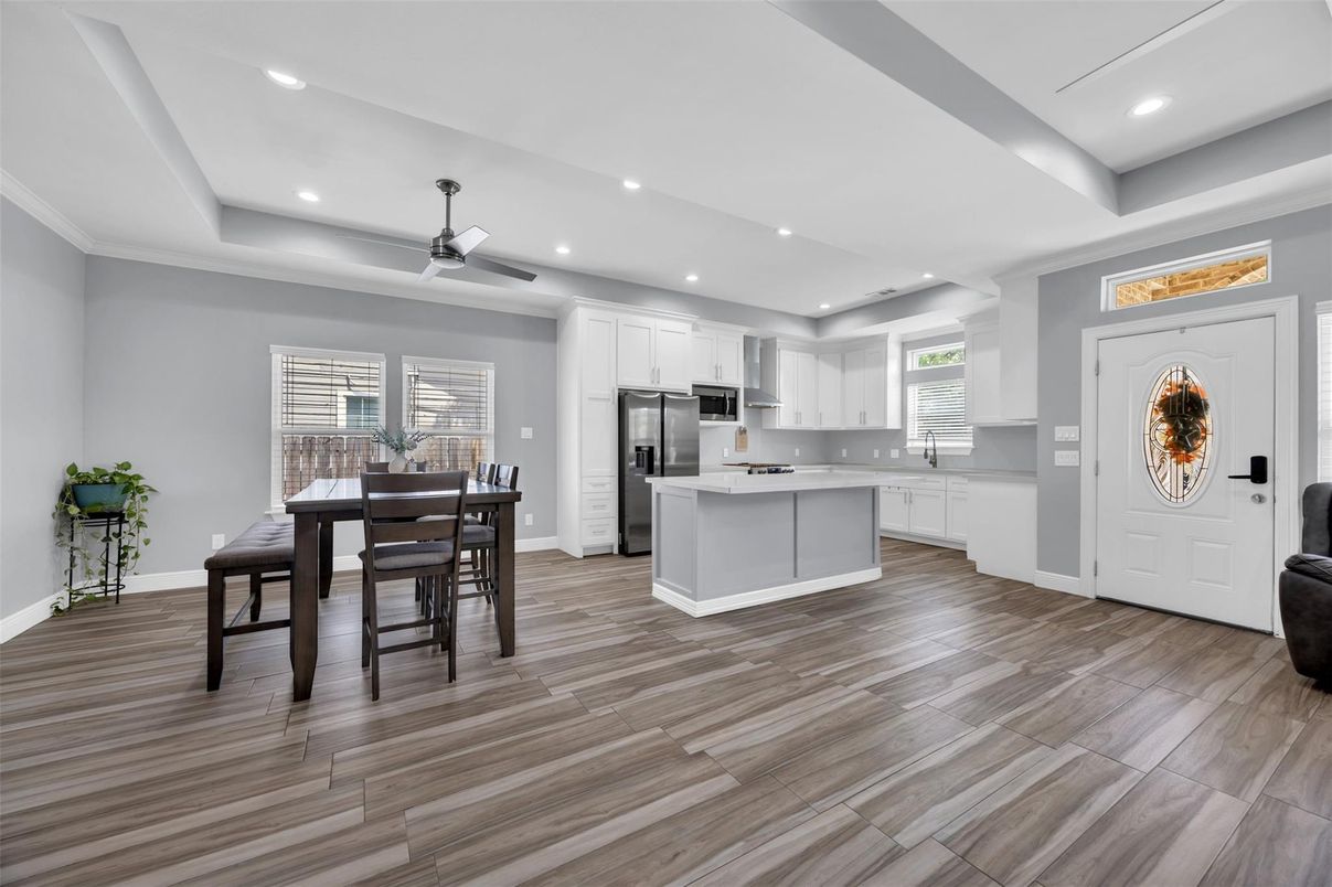 Dining room, Interior, Kitchen, Recessed Lighting, Stainless Steel Appliances, Wood Texture Flooring