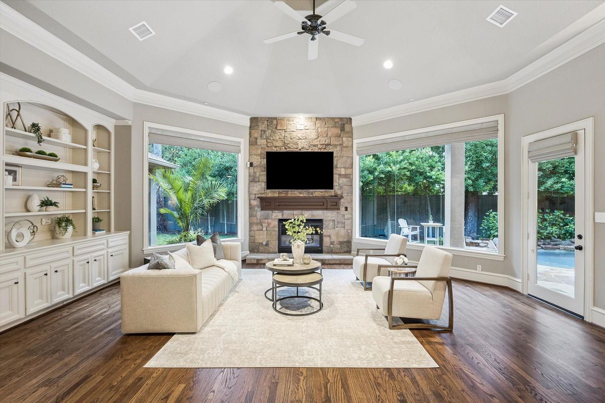 Fireplace, Interior, Living room, Recessed Lighting, Stone Walls, Wood Texture Flooring