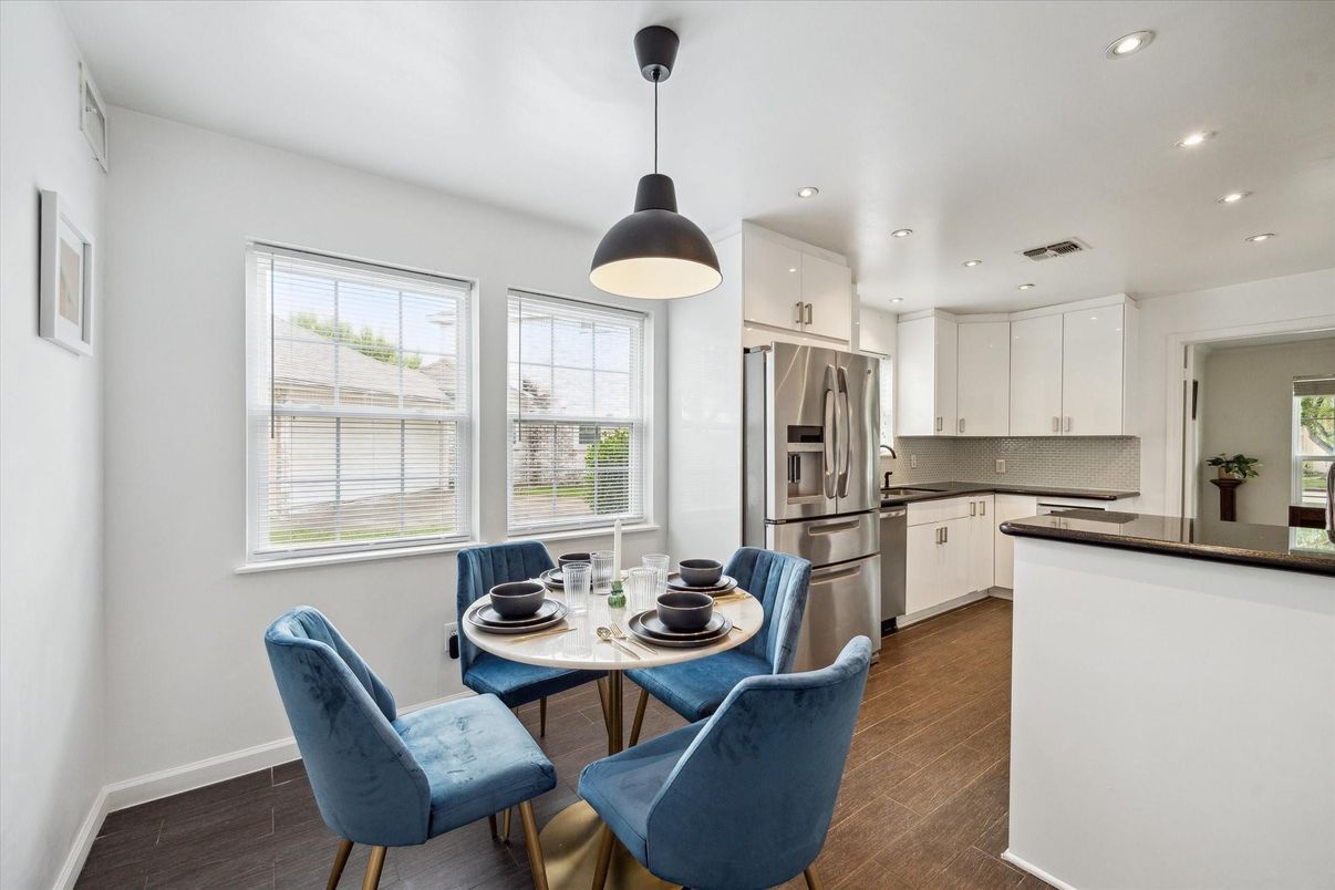 Dining room, Interior, Kitchen, Pendant Lights, Recessed Lighting, Stainless Steel Appliances, Wood Texture Flooring